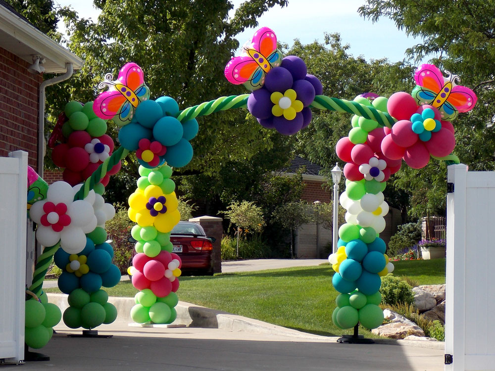 Flower balloon arch and balloon columns