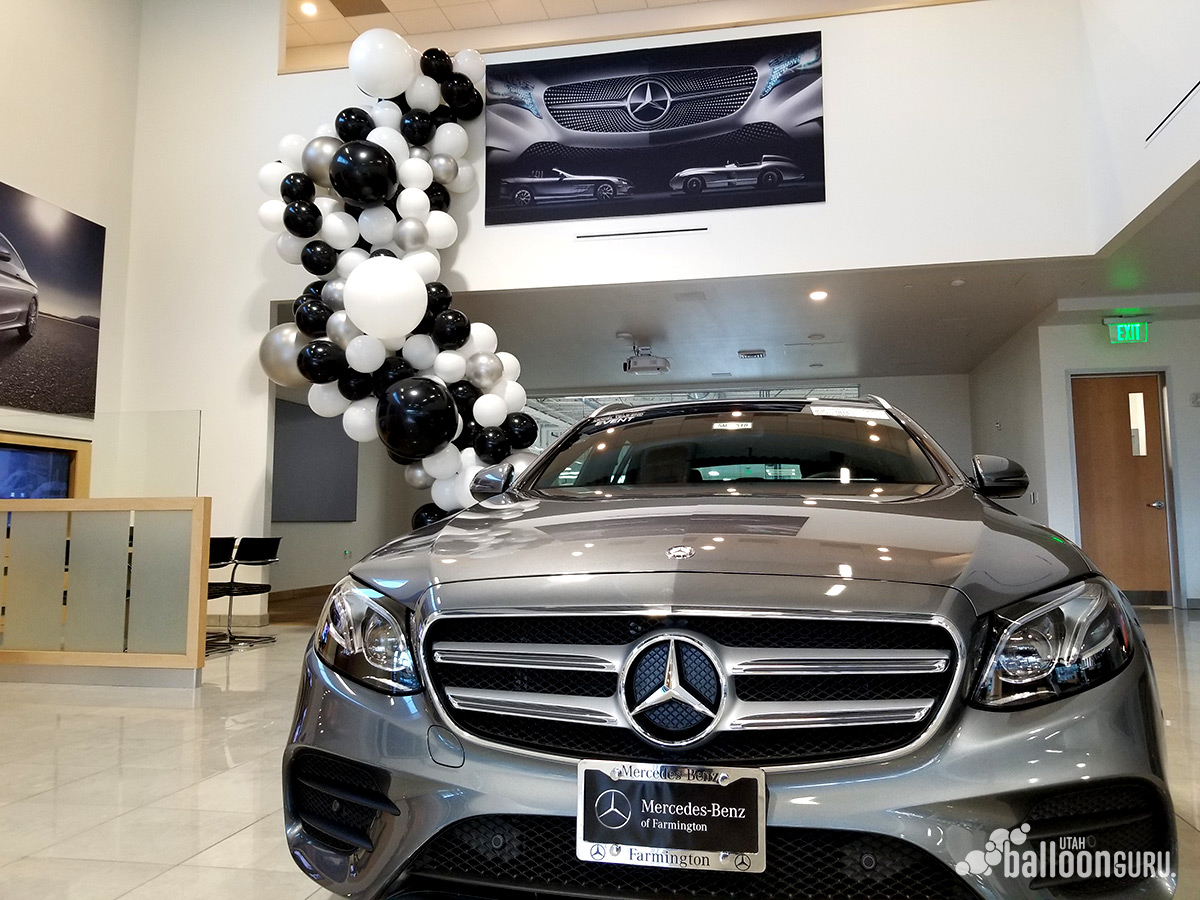 Organic Balloon display made by a balloon decorator at a car dealership.