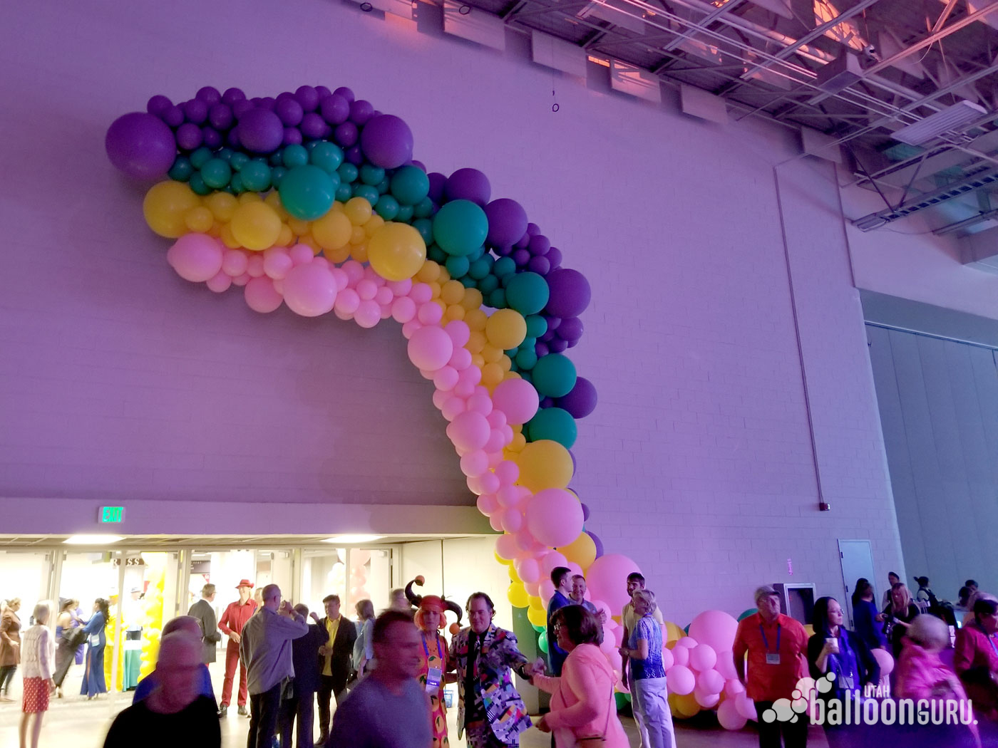 Giant rainbow balloon arch made by Utah Balloon Guru.