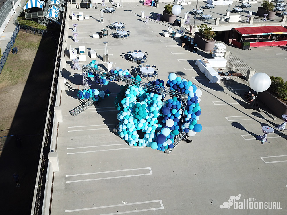 Balloon decorating ideas for a parking structure party.